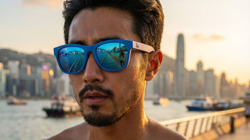 Man wearing 2nu performance sunglasses outdoors in golden hour light, showing all-round frame fit for movement and daily wear